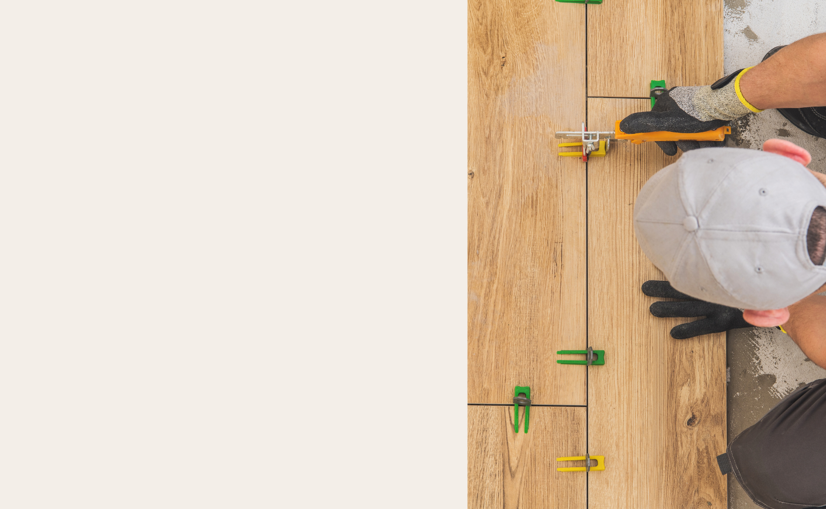 Flooring planks aligned with leveling spacers during installation